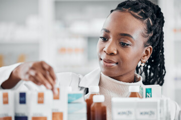 Pharmacy shelf, medicine and black woman with pills, supplements and medication for wellness in clinic. Healthcare, pharmaceutical store and pharmacist check drugs, vitamins and medical products - obrazy, fototapety, plakaty