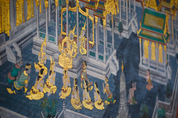 Temples and tourists at Bangkok's Grand Palace. The Grand Palace is made up of various buildings, halls and pavilions.