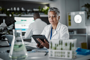 Woman, thinking or tablet in biology laboratory in plant science, medical research or gmo food...