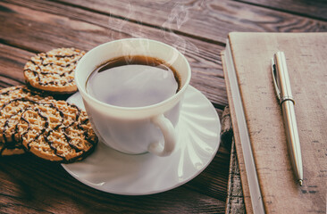 Coffee Break - Notepad and Pen along with coffee
