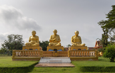 Phuket. Thailand. November 15 2022. Three traditional giant statues of old Buddhist monks in...