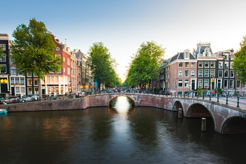 Amsterdam Canals with bridge and dutch houses, Netherlands