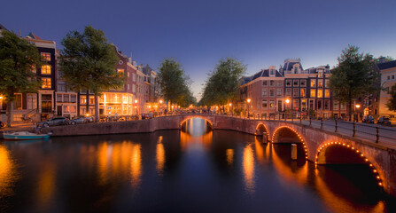 Fototapeta premium Amsterdam Canals with bridge and dutch houses, Netherlands