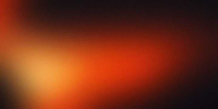 Abstract dark background with blurry gradient of orange and red, wide wallpaper for web design and ad banners