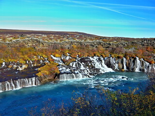 Fototapeta na wymiar Iceland-view of waterfalls Hraunfossar in lava