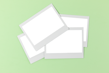 Instant picture frames on light green background