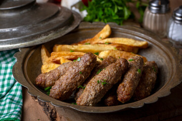 Traditional Turkish food; dry meatballs or inegöl meatballs with potatoes (Turkish name; Kuru kofte or anne koftesi)