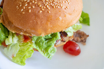 Home made beef hamburger with cheese and vegetables