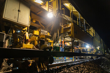Ouvrier sur chantier de train