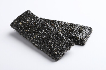 Black sesame seeds  bar - sweet made with sesame and palm sugar. Tilgul Laddu, Til Gul balls for makar sankranti, Roasted thala  bar