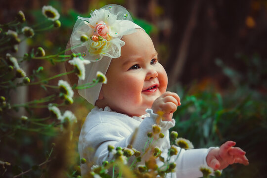 Little girl in flowers