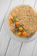 Home made cake decorated on whine wooden background