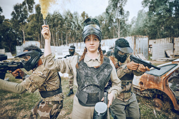Start, battle and girl with smoke during paintball, military training and army game in Spain. War, alert and woman playing with gear and equipment during a competition, sports and action on a field