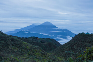 Fototapeta na wymiar Mount Sumbing and Mount Sindoro view from top of Mount Prau Central Java