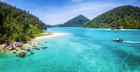 The beautiful Chong Khat bay at the remote Surin islands with turquoise sea and fine sand beaches,...