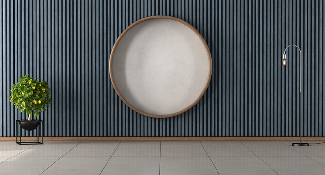 Empty room with wooden blue wall paneling and decorative circle in the center