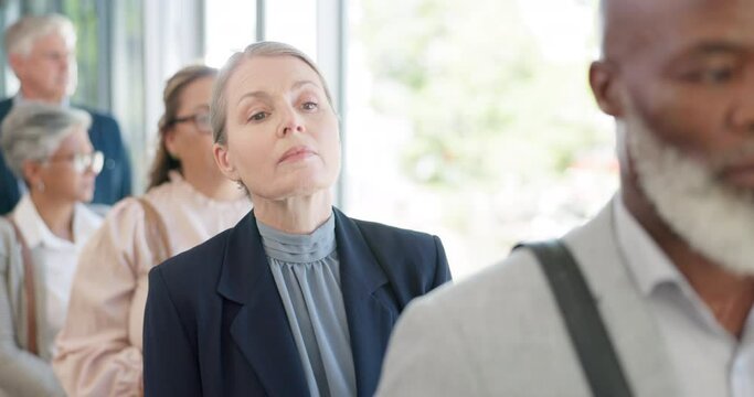 Senior staff line, waiting and mature woman with business workers standing for a job interview. Workplace, corporate company and hiring group with a elderly female ready for working and appointment