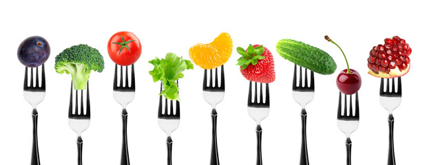Fruits and vegetables on fork isolated on transparent background. Png format	
