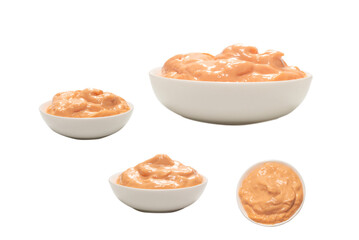 Sauce in a bowl isolated on white.