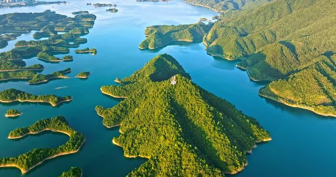 Aerial footage of Thousand Island Lake natural scenery in Hangzhou, Zhejiang Province, China. Green mountain and lake nature landscape in summer.