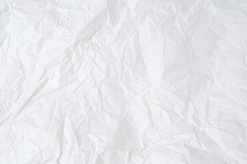 Crumpled white paper background texture with place for text