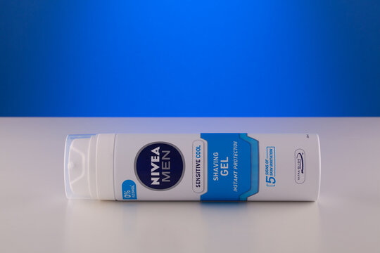 Container of Nivea Men Sensitive Cool Shaving Gel on blue background