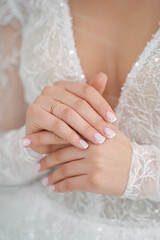 gentle hands of the bride close-up
