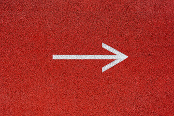Two white arrows opposite each other on a red background