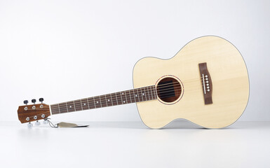 Musical instrument - Front view classic wooden left hand acoustic guitar