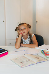 child drawing with pencils