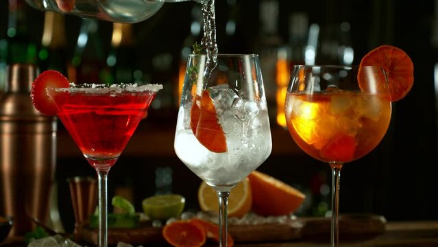 Super slow motion of making highball cocktails with camera movement. Filmed on high speed cinema camera with cinebot, 1000 fps.