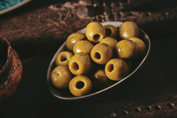 Plate with yummy marinated olives