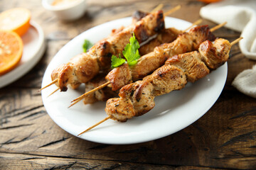 Homemade chicken skewers with orange