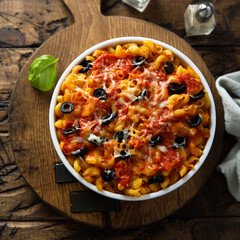 Homemade pasta bake with olives and tomato