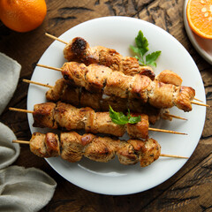 Homemade chicken skewers with orange