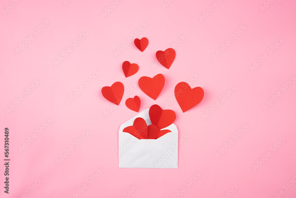 Poster heart shape paper out of the envelope for valentine background and copy space