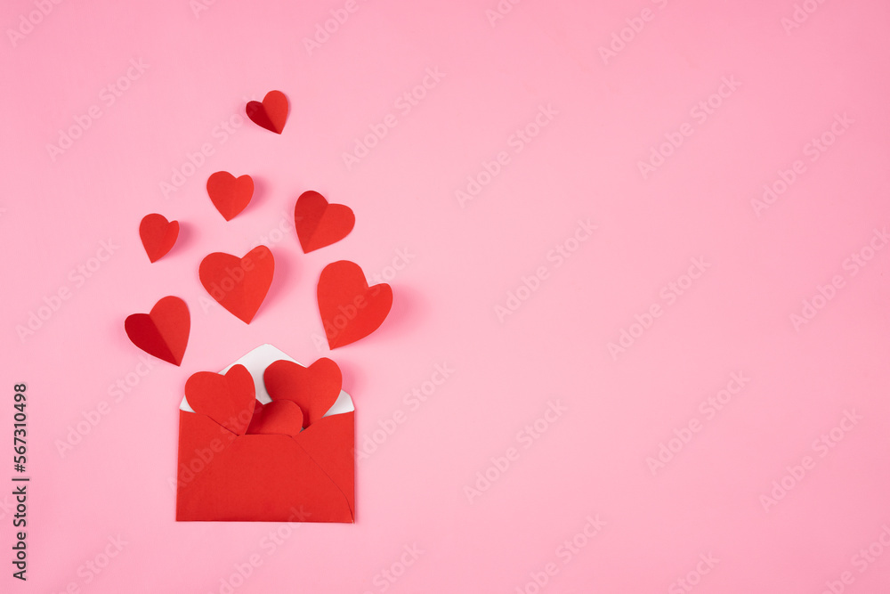 Poster envelope containing a heart shape for romance and valentines day copy space