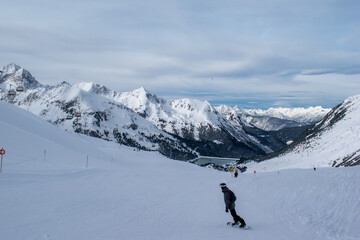 Fototapeta na wymiar Ski in winter season, mountains and ski touring on the top of snowy mountains in Tirol, Austria.