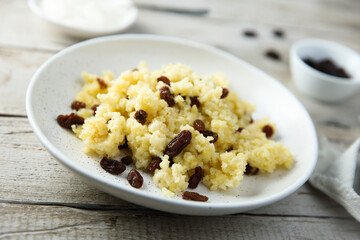 Homemade millet porridge with raisins