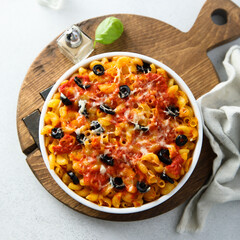 Homemade pasta bake with olives and tomato