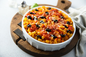 Homemade pasta bake with olives and tomato