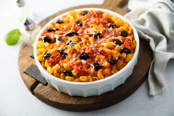 Homemade pasta bake with olives and tomato