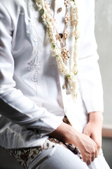 close up elegant white groom wedding dress