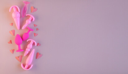 Pink silicone sex toys and paper heart on a pink background. the concept of valentine's day, love....