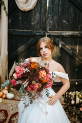 Beautiful bride in rustic arrangement