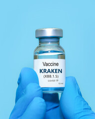 A doctor in medical gloves holds a bottle with coronavirus Covid19 XBB.1.5 Kraken Varian strain vaccine.The concept of medicine, healthcare and science.Coronavirus vaccine. Copy space