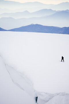 Man hiking to ski, Chile