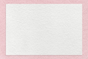 Fototapeta premium Texture of craft white color paper background with pink border, macro. Structure of vintage dense kraft rose cardboard