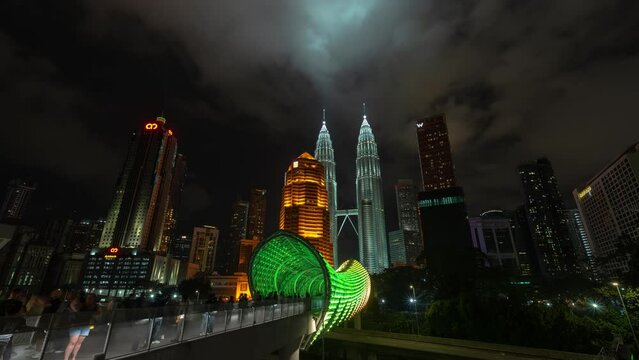 Time Lapse Pintasan Saloma Link Pedestrian Bridge Kuala Lumpur, Malaysia - Cityscape Petronas Towers at Night