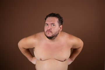 Fototapeta premium Portrait of a young surprised man.